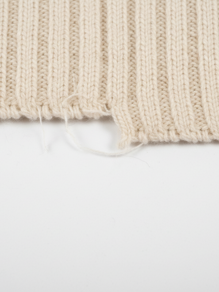 Women's Knit Poncho cream fabric